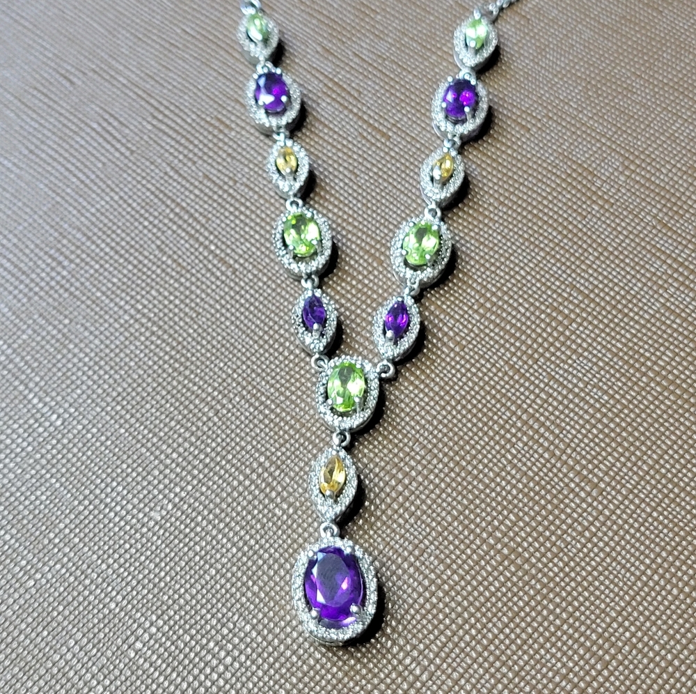 Elegant Silver Necklace with Purple, Green, and Yellow Accents